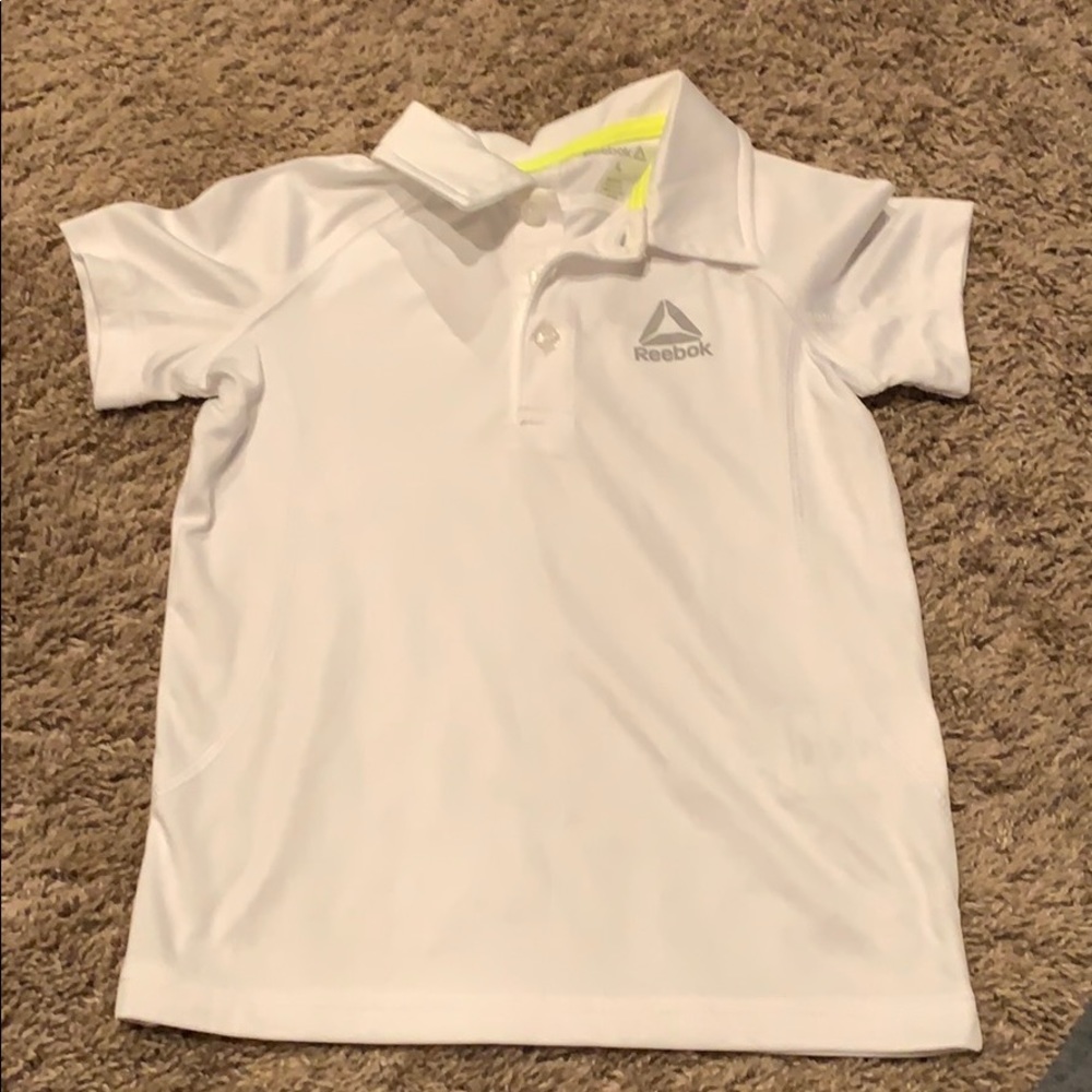 Boys Reebok short sleeve white polo. Size 4.